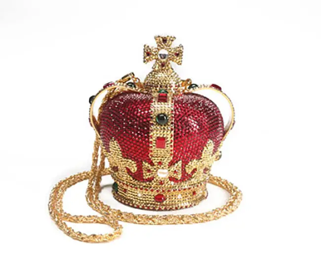 Katherine Baumann crown-shaped minaudiere with red, green and gold jewels.