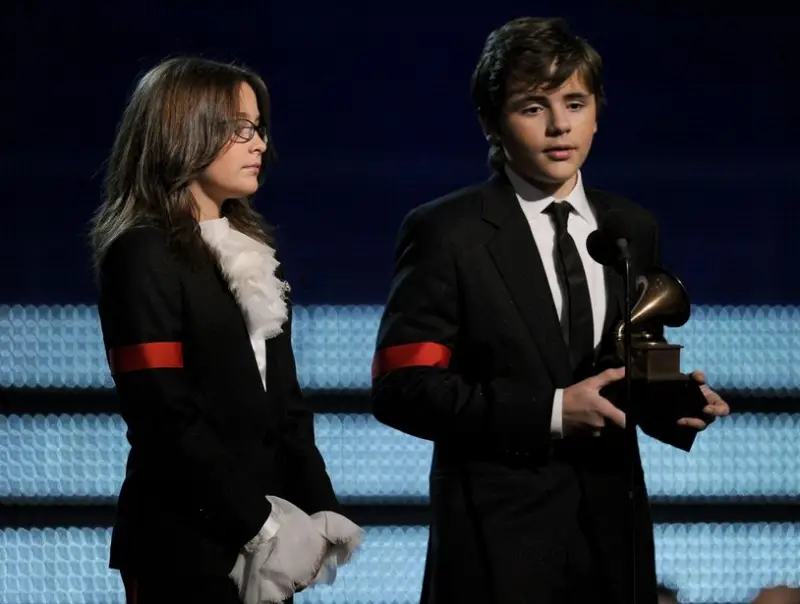 Paris and Prince Jackson accept the lifetime achievement award for their father Michael Jackson at the Grammys.
