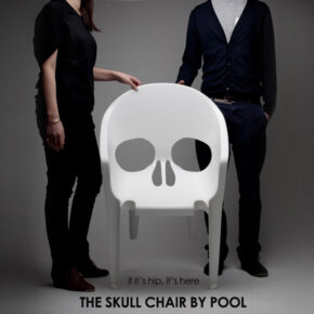 White Fiberglass Skull Chair By Pool.