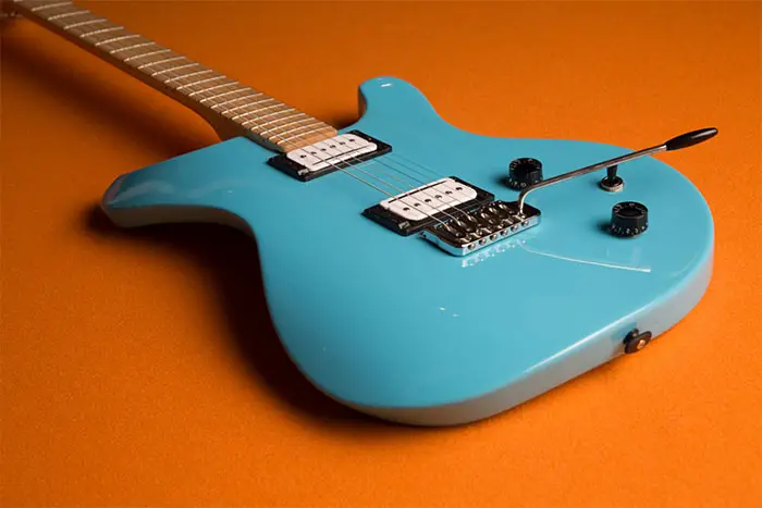 aqua blue sinuous guitar
