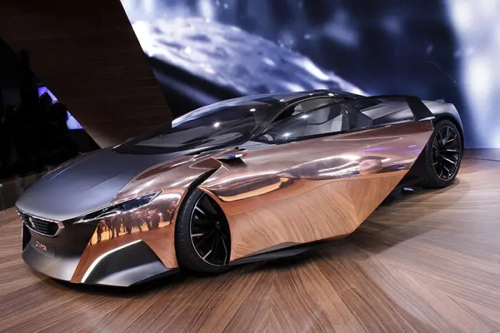 Read more about the article Peugeot’s Onyx Concept Supercar, Superbike and Superscooter Wrap Hybrid Technology and Beauty In Shiny Copper and Matte Black.
