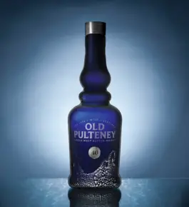 Old Pulteney 40 Year Old Unveiled In Special Hand Blown and Sterling Silver Bottle With Stone Closure and Blue Lacquered Box.