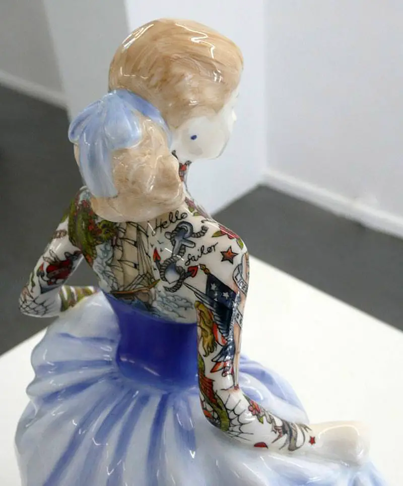 tattooed porcelain figurines