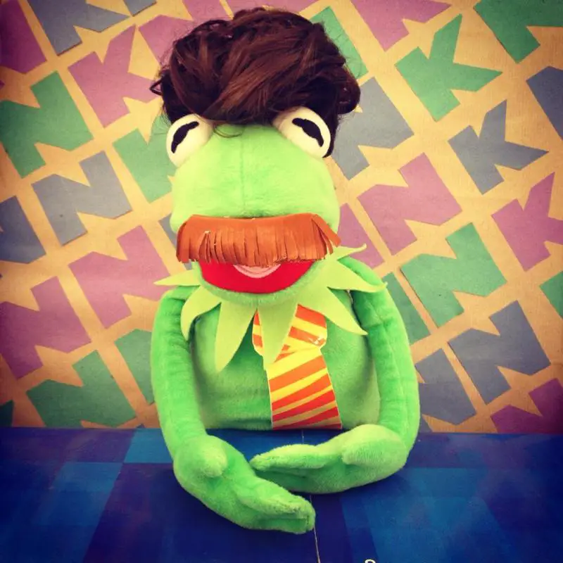Kermit as Ron Burgundy