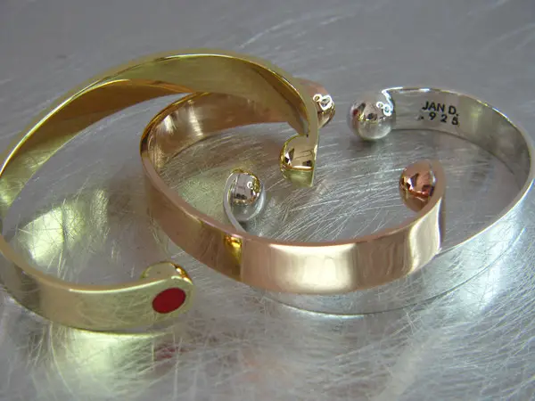 Red dot cuffs gold and silver