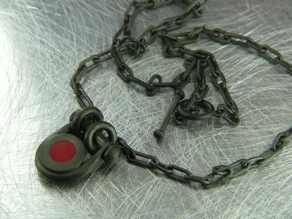 red dot necklace blackened