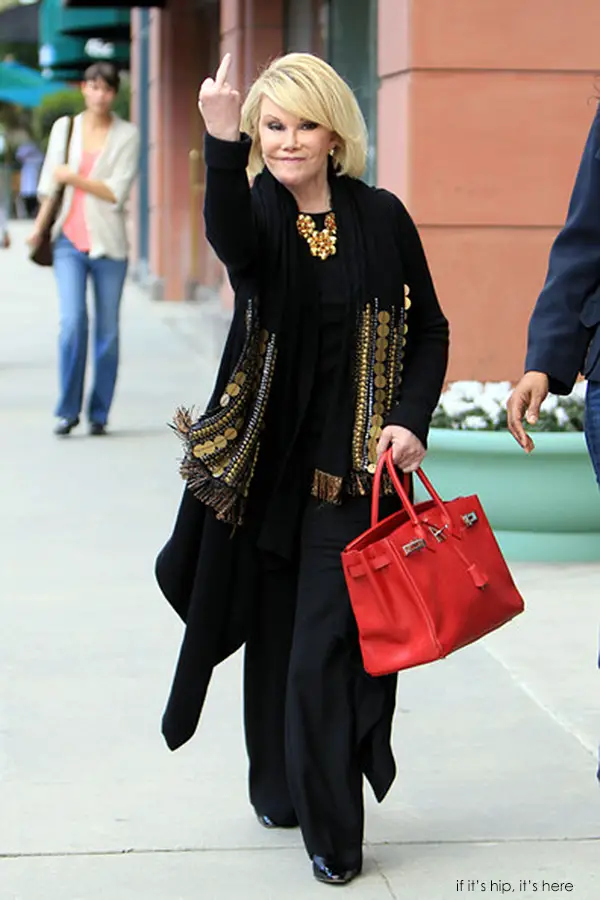 Joan Rivers flipping the bird