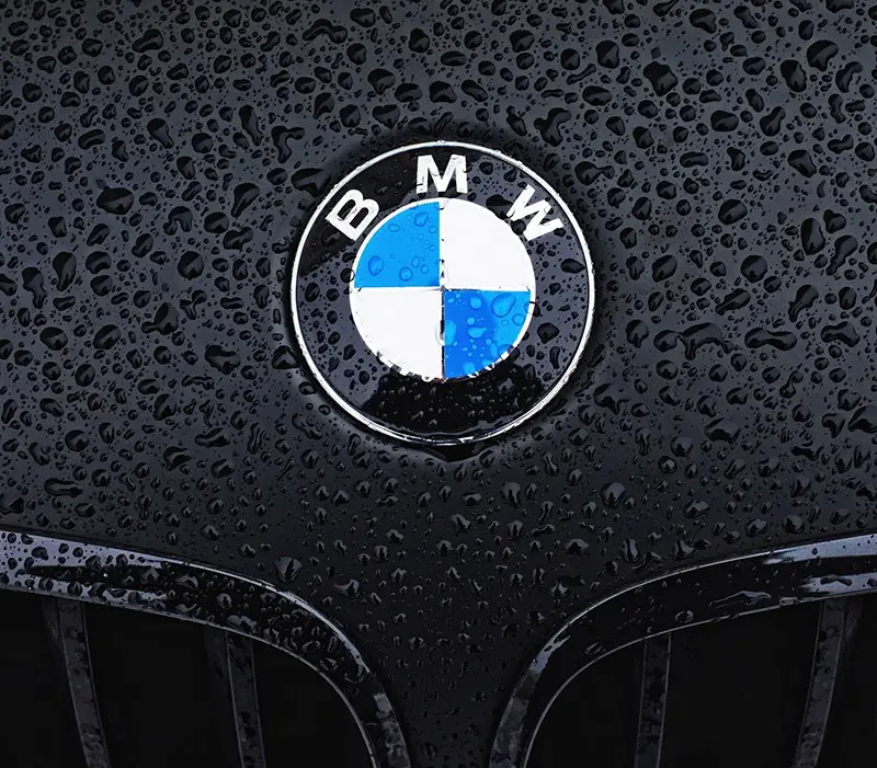 bmw on wet hood