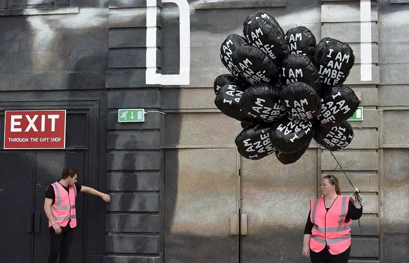 workers at Dismaland