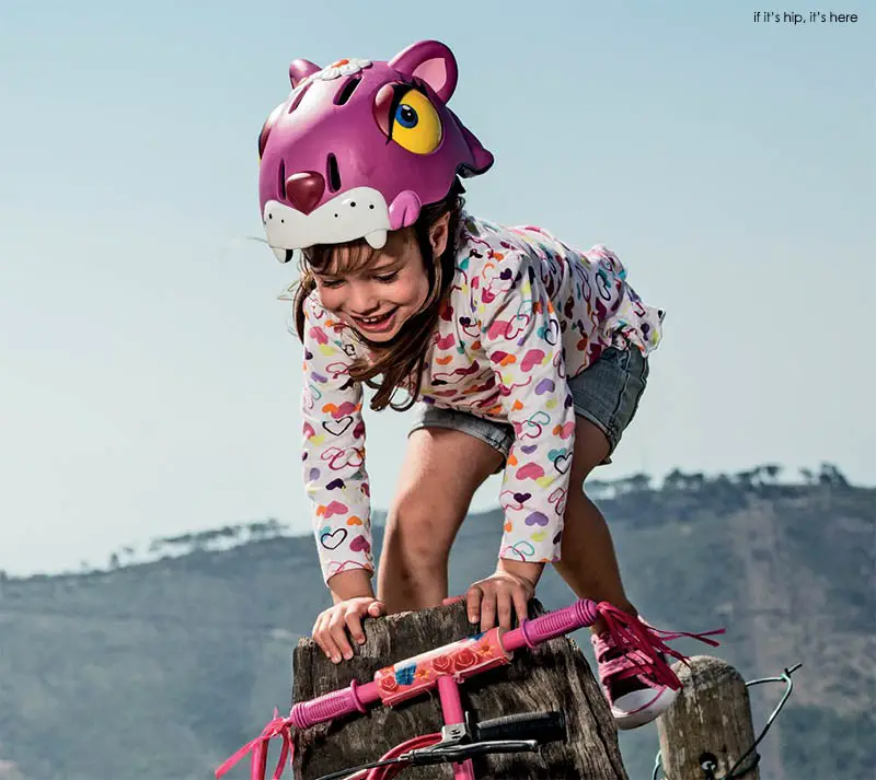 little girl with cheshire cat helmet