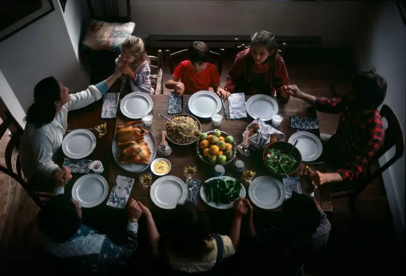 Eve Arnold, 1984, Family Thanksgiving Dinner Blessing. Whitesburg, Kentucky