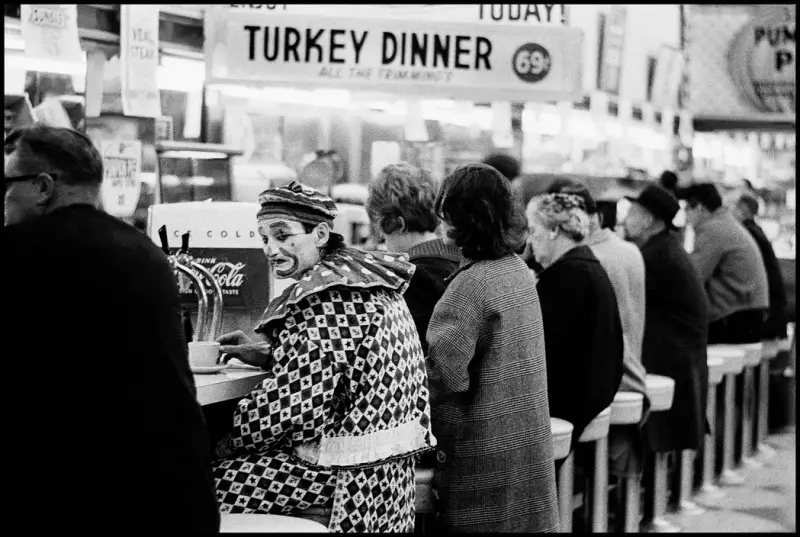 Thomas Hoepker, 1963, Clown at a diner on Thanksgiving in Reno, Nevada.