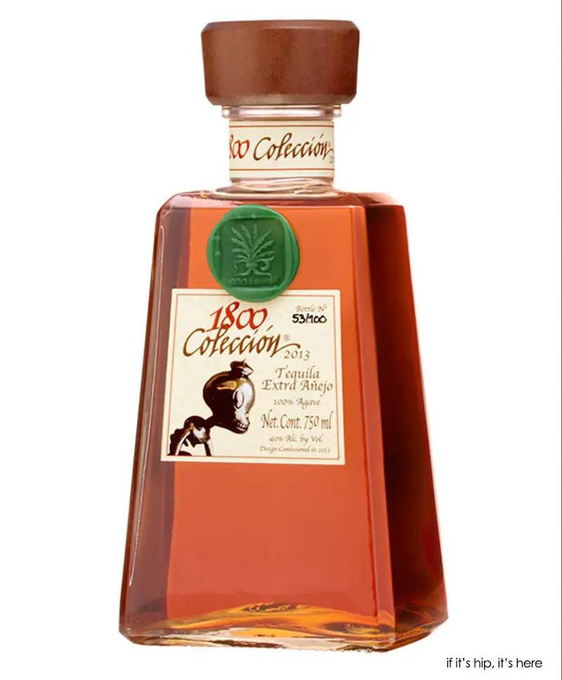 bottle of 1800 coleccion extra anejo tequila with baseman label