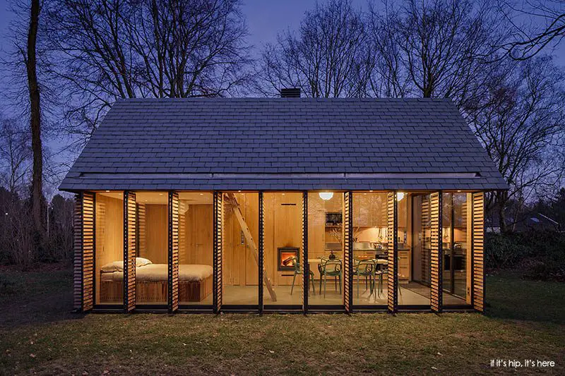 utrecht cabin by zecc architects shutters open evening
