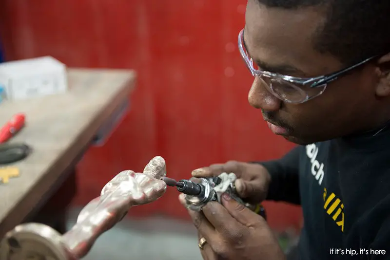 sanding the oscar statuette