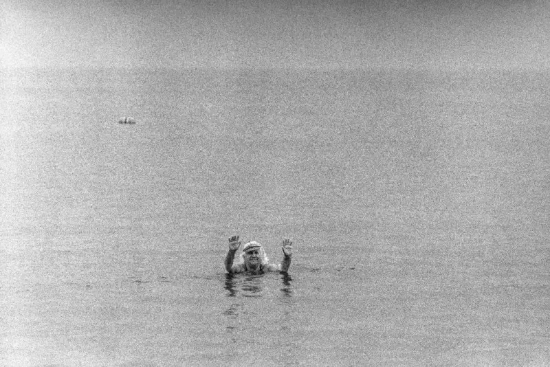 Diane Arbus, Old woman with hands raised in the ocean, Coney Island, N.Y., 1960