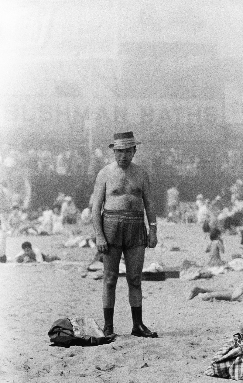 Man in hat, trunks, socks, and shoes, Coney Island, N.Y. 1960