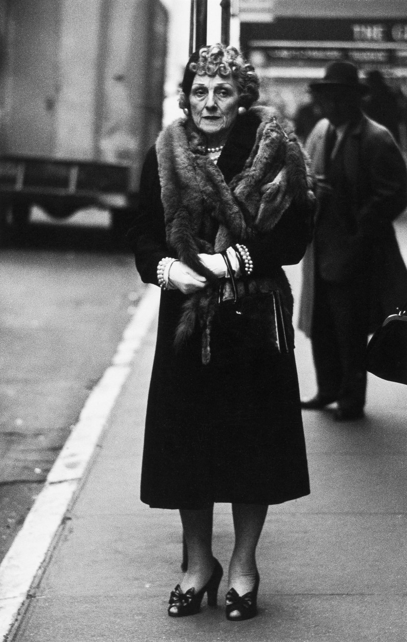 Woman in a mink stole and bow shoes, N.Y.C. 1956