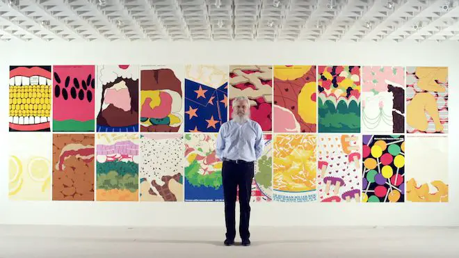 Now Herman Miller's Vice President of Creative Design, Steven Frykholm stands in front of his summer picnic posters