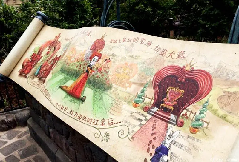 Some of the Alice in Wonderland art featured at the park's Maze entrance.