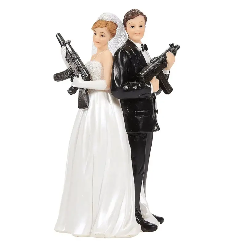bride groom cake topper with automatic rifles
