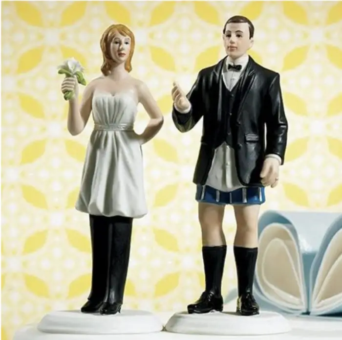 groom not wearing the pants cake topper