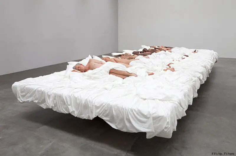 kanye west sculpture of people in bed