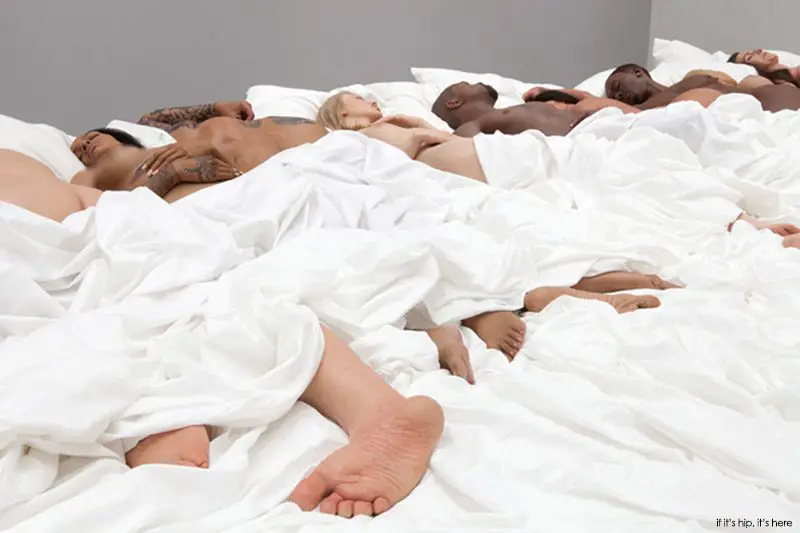 kanye west sculpture of people in bed