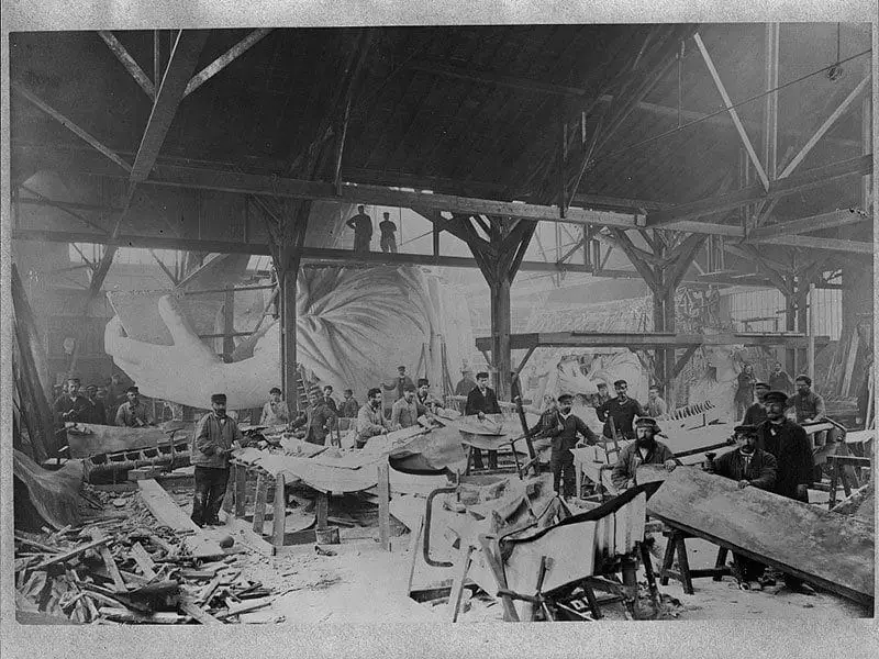 Workmen constructing the Statue of Liberty in Bartholdi's Parisian warehouse workshop in the winter of 1882. (Albert Fernique/U.S. Library of Congress) 