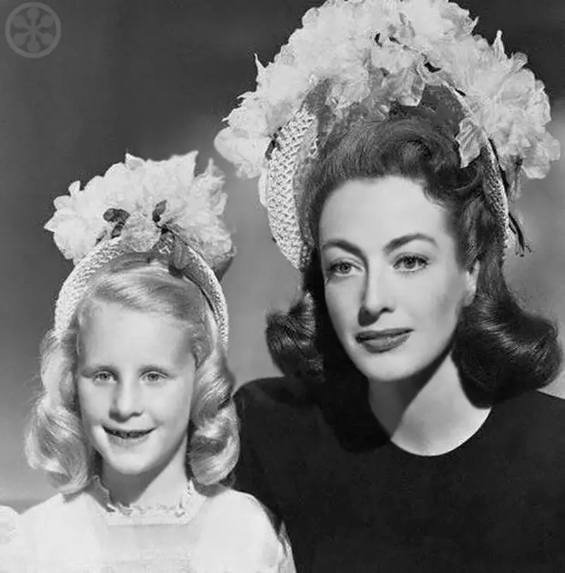 Joan Crawford with her adopted daughter Christina in Easter Bonnets