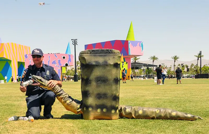 artist painted trash cans