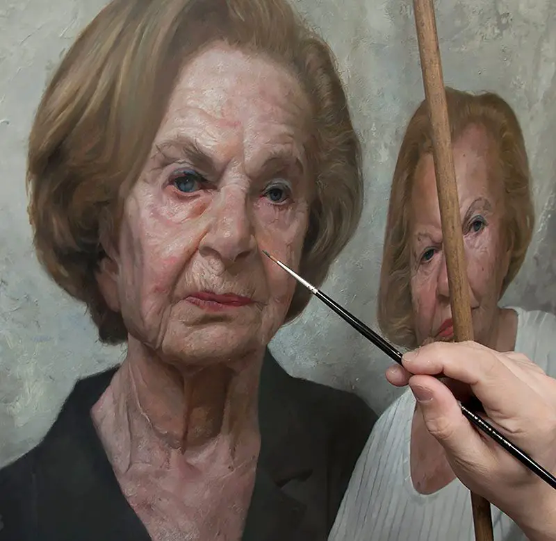 Kassan painting the portrait of the surviving twin sisters