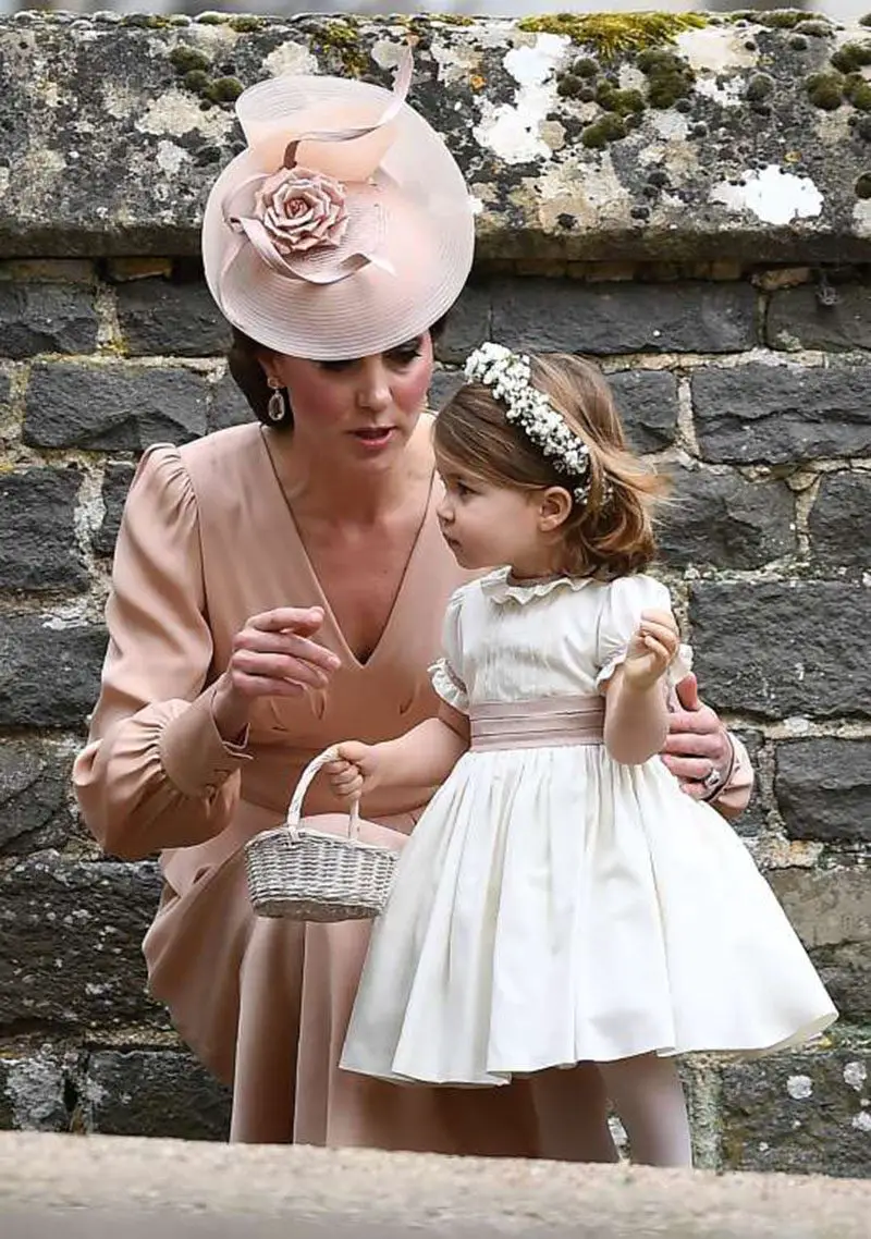 Catherine, Duchess of Cambridge and Princess Charlotte of Cambridge. at middleton wedding