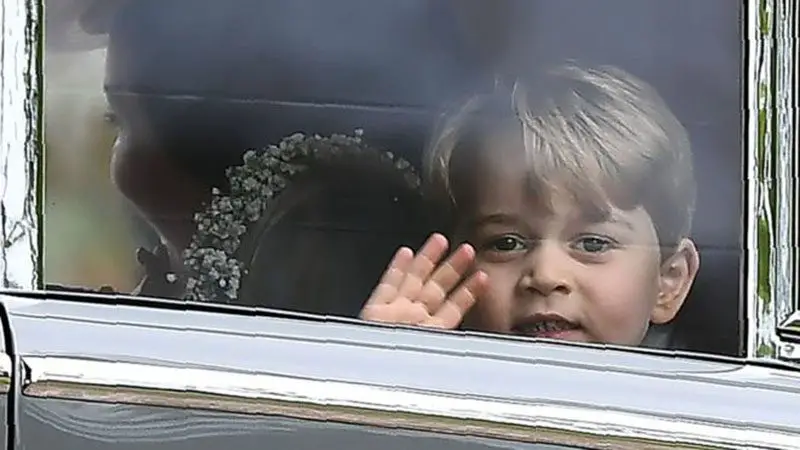Prince George waves for the cameras
