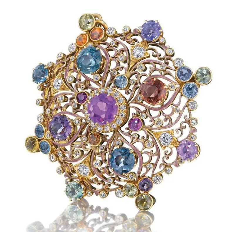 Renaissance Revival multi-colored sapphire and enamel brooch by Louis Comfort Tiffany