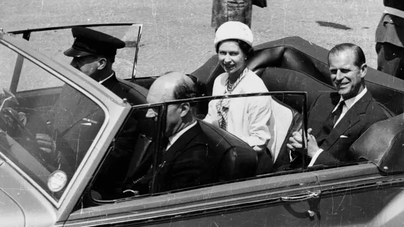 Queen Elizabeth II and Prince Charles in her 1977 VI Phantom State Limousine
