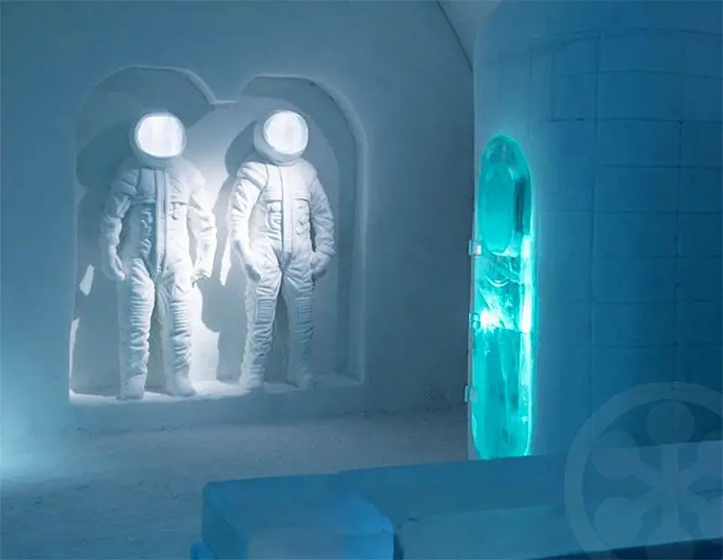 snow sculptures of astronauts