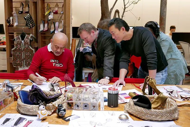 Louboutin working on the shoe designs with Doug Chiang, photo by Genevieve Elkin for VF
