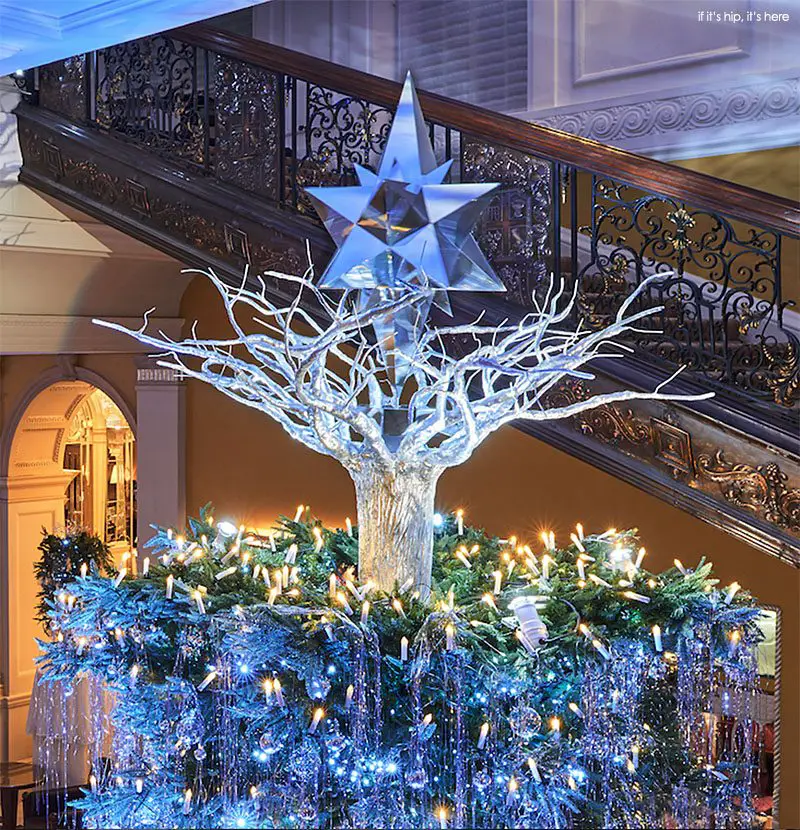 multi-faceted star atop tree