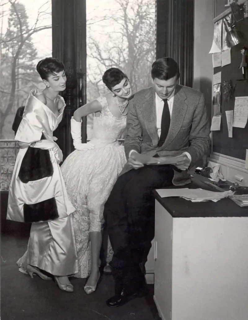 Hubert de Givenchy and models in his gowns