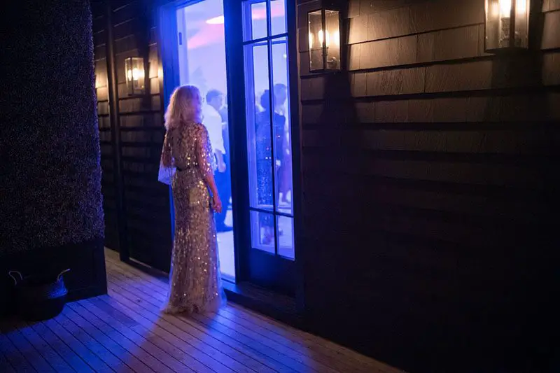 Actress Blythe Danner, Gwyneth's mother, steals a quiet moment at the reception.