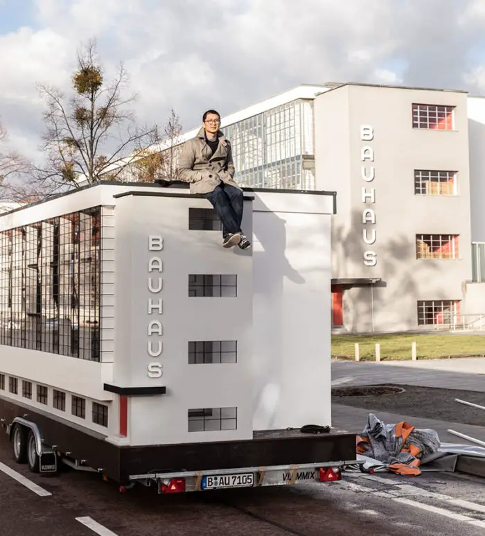 Van Bo Le-Mentzel on top of his Wohnmaschine – a tiny house version of the Bauhaus building in Dessau, photo © Mirko Mielke