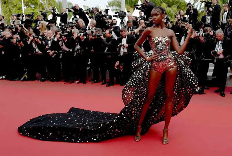 Model Leomie Anderson in a mirror-embellished Rami Kadi gown