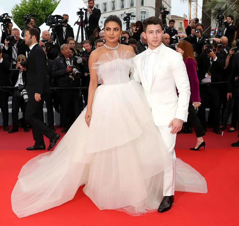 Priyanka Chopra (wearing a strapless Georges Hobeika gown) and Nick Jonas