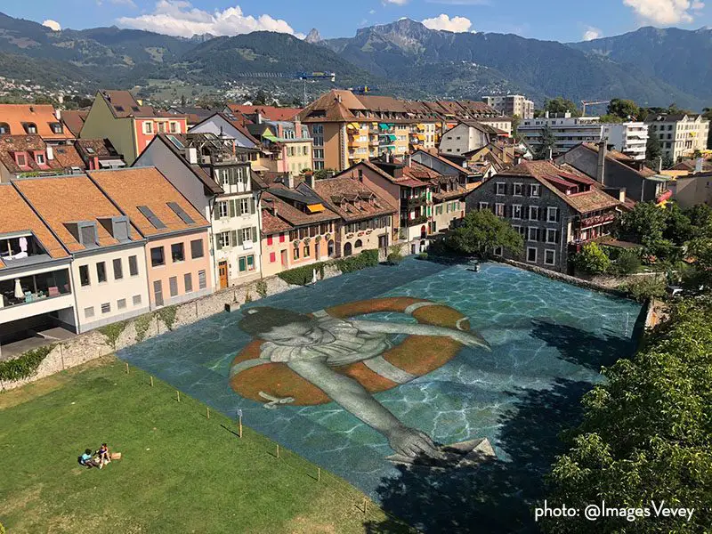 artist saype decorated pool