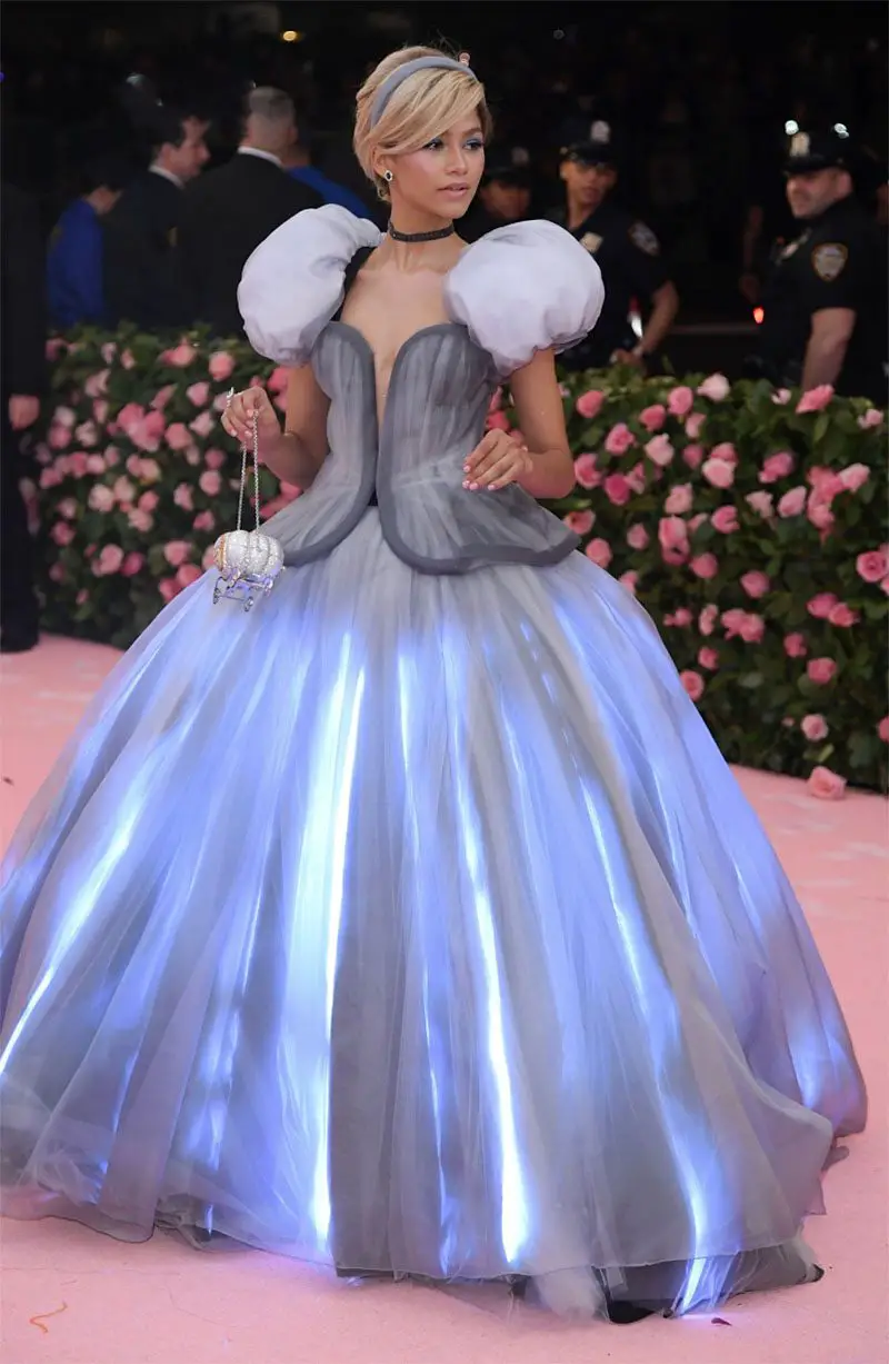 Zendaya dressed as Cinderella with an illuminating gown