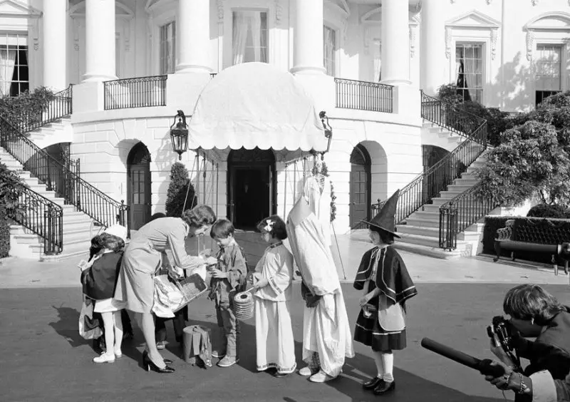 First Lady Betty Ford during a Halloween benefit for the United Nations International Children's Emergency Fund on the White House South Lawn. You can see the White House's iconic Portico was not decorated at that time.