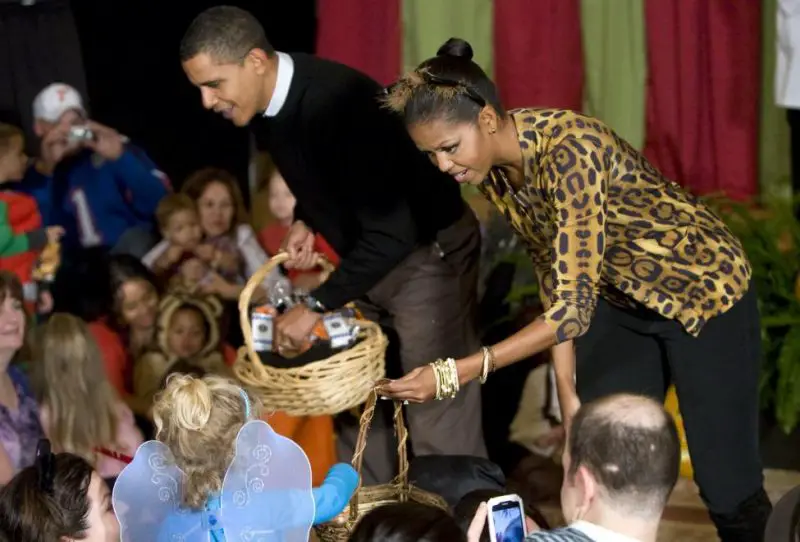 The Obamas hand out Halloween candy in the White House, 2009
