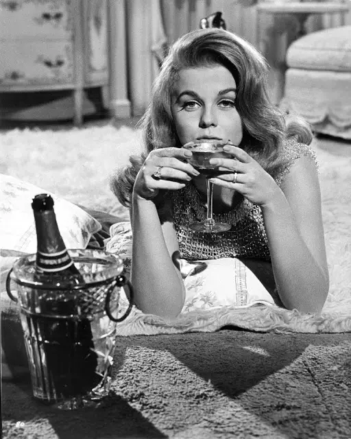 Ann Margret sipping