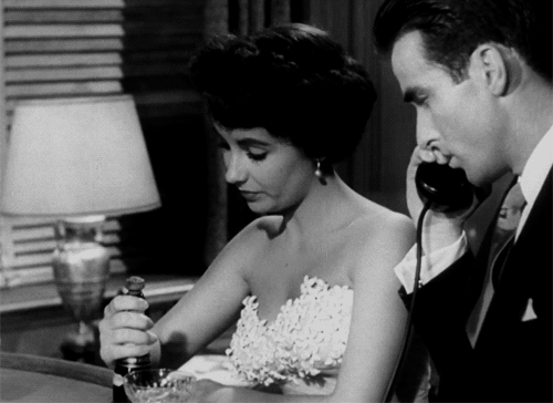elizabeth taylor sipping champagne